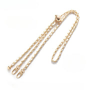black crossbody with gold chain