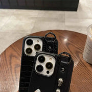 leather iPhone case with skull medal