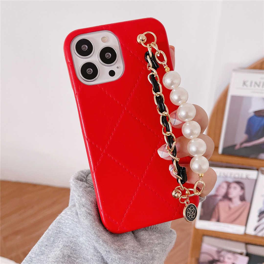 red iPhone case with hand strap