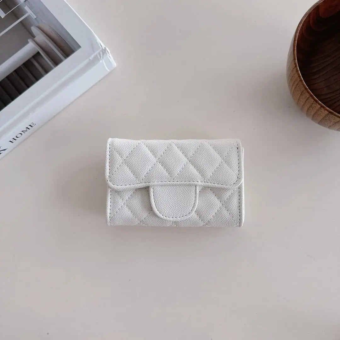 white flap wallet