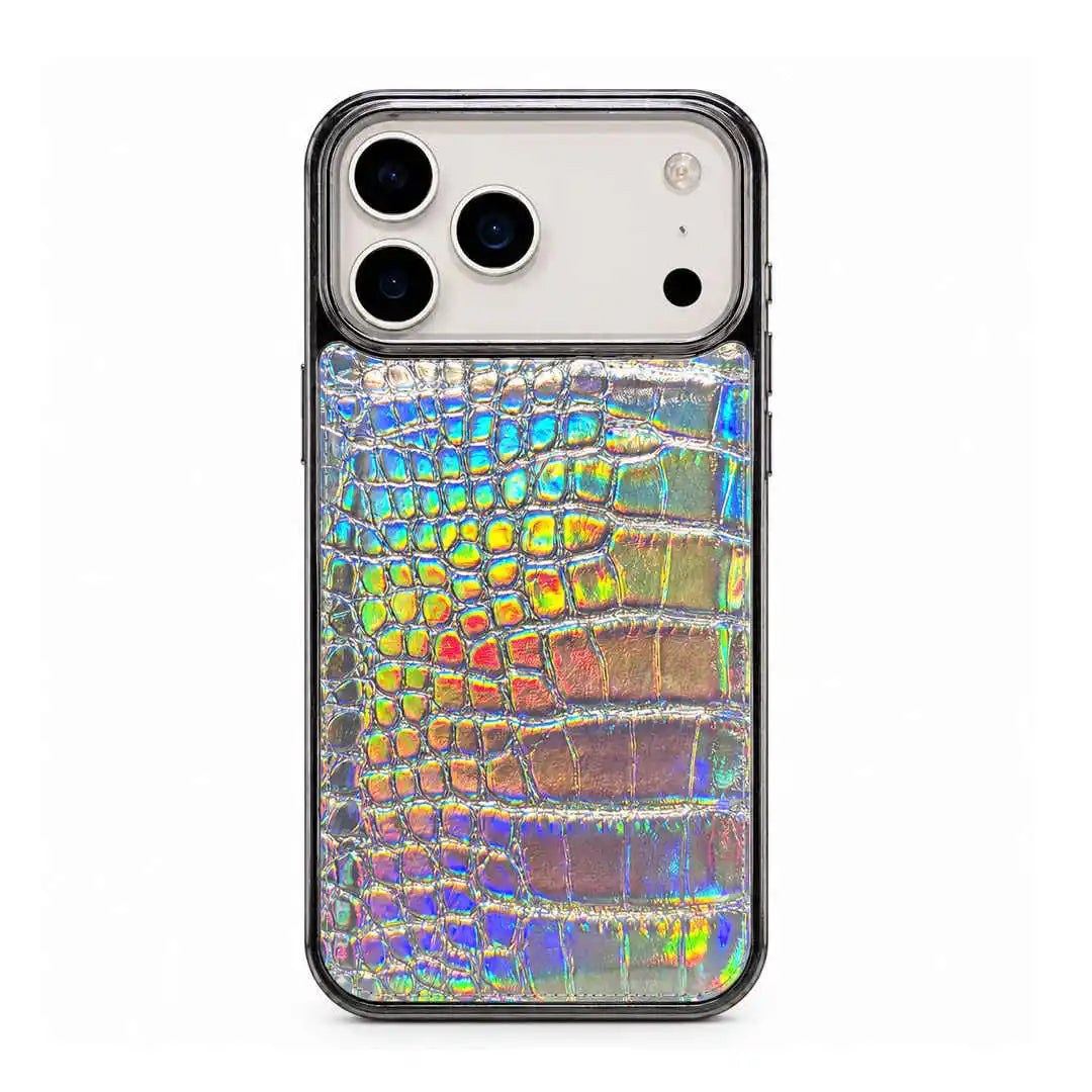 A phone case featuring a holographic, iridescent crocodile skin texture on a light gray phone, shown against a plain white background.