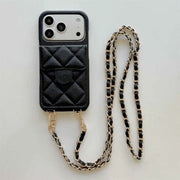 Black quilted wallet phone case with a chain strap on a light gray background