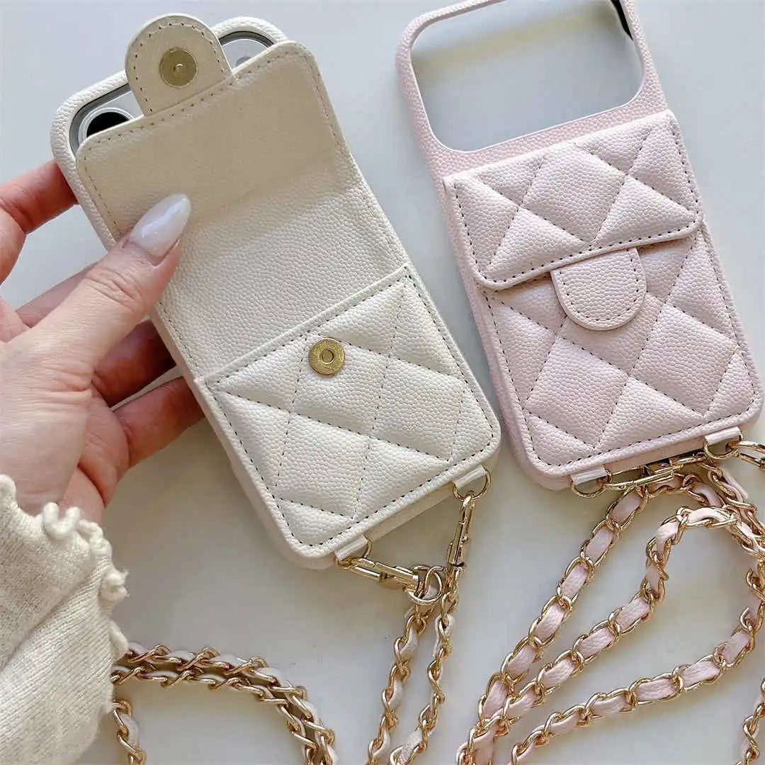 Two quilted phone cases, one beige and one pink, with a hand holding the beige case.