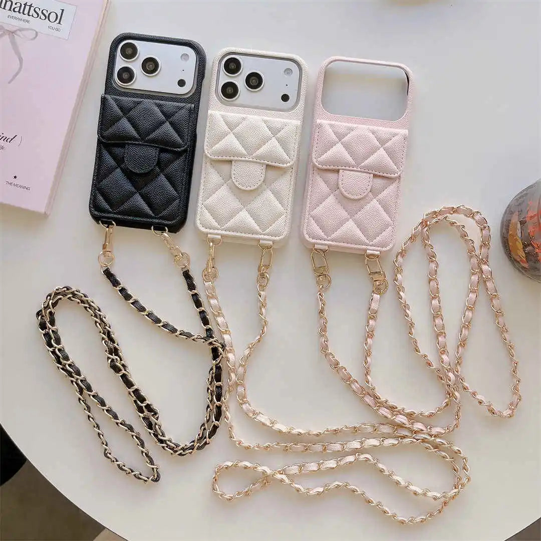 Three quilted wallet phone cases with chain straps on a white surface.