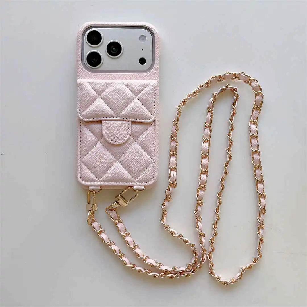 Pink quilted phone case with a chain strap on a light gray background