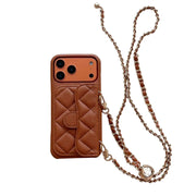 brown quilted phone case with a chain strap on a white background