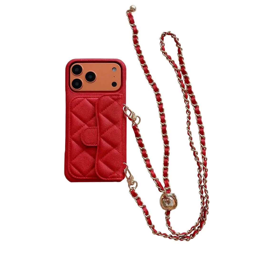 Red quilted phone case with a matching chain on a white background
