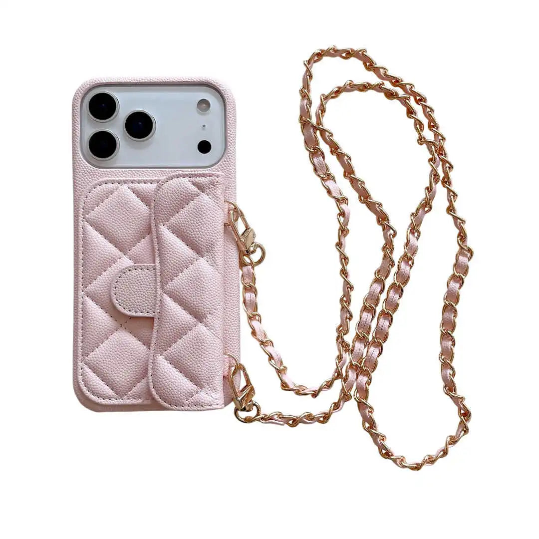 Pink quilted phone case with a chain strap on a white background