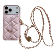 Pink quilted wallet phone case with a crossbody chain strap on a white background