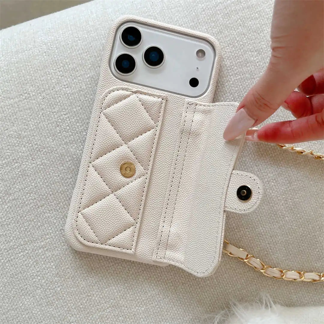 white quilted wallet phone case with a chain strap held by a hand on a light background