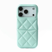 Mint green quilted phone case with card holder on a white background