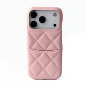 Pink quilted phone case with card holder on a white background
