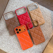 five quilted phone cases in different colors on a textured surface