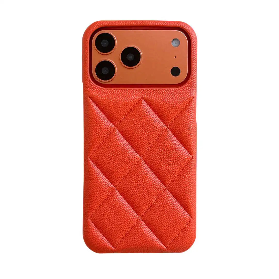 orange quilted phone case on a white background 
