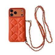 Quilted orange phone case with a chain strap on a white background