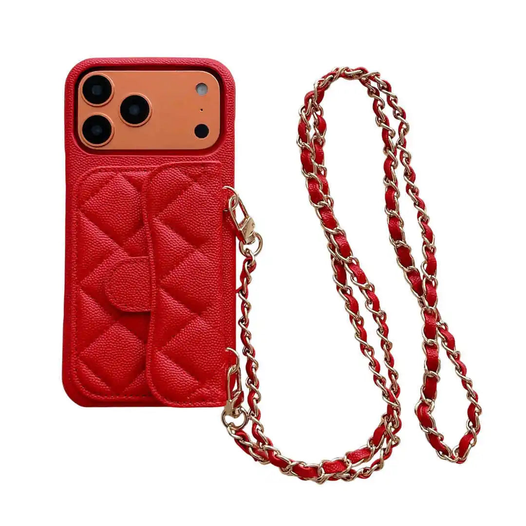 Red quilted phone case with a chain strap on a white background