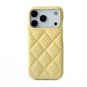 Yellow quilted phone case on a white background