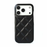 Black quilted phone case on a white background